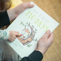 Personalised Father's Day book titled 'My First 310 Days – For My Daddy by Blake', held by a father and child, with a sweet monkey illustration – perfect keepsake gift for a new dad’s first Father's Day.
