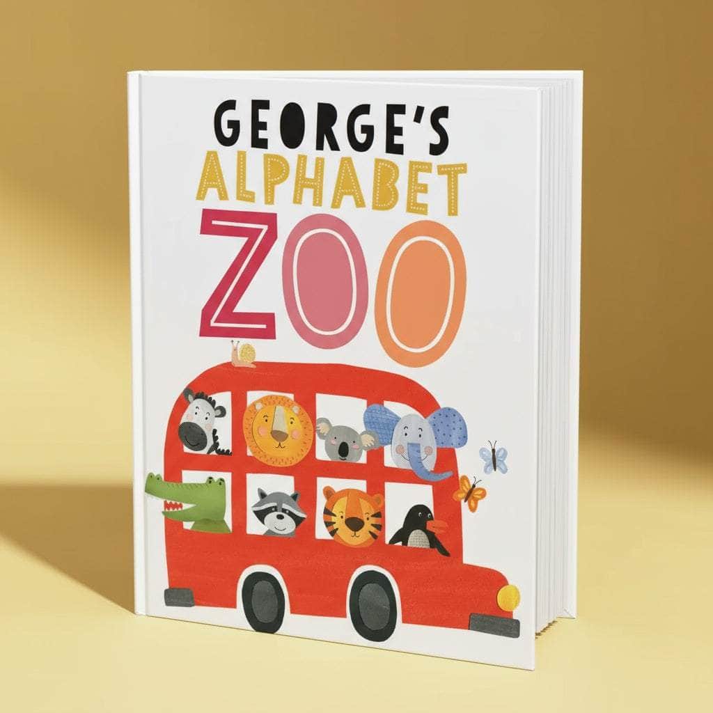 Book titled 'George's Alphabet Zoo' with a red bus illustration on a yellow background